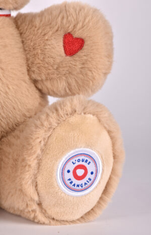 L’Ours Français Musical « TAM TAM » beige – 30 cm
