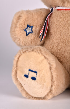 L’Ours Français Musical « TAM TAM » beige – 30 cm